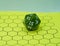 Yellow role-playing board with green dice