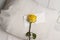 Yellow rose and letter
