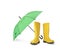 Yellow rubber boots and green umbrella