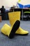 Yellow rubber boots for workers and medical personnel