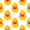 Yellow rubber duck seamless pattern. Fun kids background.