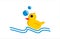 Yellow rubber duck swims on the waves