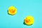 Yellow rubber ducks organized on blue background