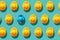 Yellow rubber ducks on turquoise blue background one duck different