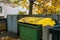 Yellow rubbish container