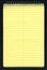 Yellow ruled spiral notepad over black