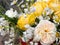 Yellow rustic bouquet. Home grown flowers arranged in a tin.