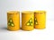 Yellow rusty barrels with a radiation hazard sign 3D render