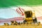 yellow rye agricultural combine harvester on field with Iran flag background, food industry concept - industrial 3D illustration