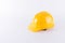 Yellow safety helmet on white background. Hard hat isolated on white. Safety equipment concept. Worker and Industrial theme