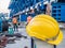 Yellow safety helmet with worker on express way construction sit