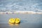 yellow sandals on beach. summer vacation