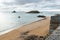 Yellow sandy empty city beach of Saint Malo, France, at high tide