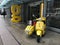 Yellow Scooter and Sidecar in front of Downtown Buildings in Vancouver, British Columbia