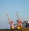 Yellow shipyard cranes