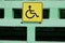 Yellow sign is a place for disabled people. Social sphere of life. Protection and assistance for people with disabilities
