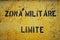 Yellow sign \'Zona Militare Limite\' in italian city Gaeta.