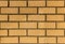 Yellow silicate brick wall closeup.