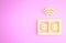 Yellow Smart electrical outlet system icon isolated on pink background. Power socket. Internet of things concept with
