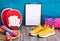 Yellow sneakers, dumbbells, jump rope, note board and massage roller