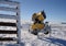 Yellow snow maker on the ski track