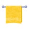 Yellow soft terry towel hanging on metal holder attached to wall. Light red bathroom interior element.