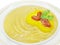 Yellow soup with pepper and tomato
