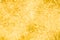 Yellow sparkling sparkling holiday tinsel background. New year and christmas, soft focus