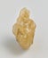 Yellow sphalerite ore on white background.