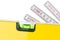 Yellow spirit level and folding rule