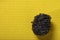 Yellow sponge background and steel scourer