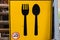 Yellow spoon and fork sign.