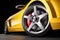 Yellow sports car . Wheel and brakes closeup. 3d render