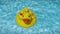 Yellow squeaky ducky family in the pool