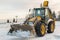 Yellow Stationary JCB Digger in Snow