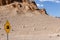 Yellow steep incline road sign for cars in the Moon Valley, Atacama desert, Chile