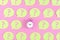 Yellow stickers with question marks are on a pink background. In the center is a pink alarm clock. Concept, a matter of