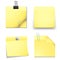 Yellow sticky blank notes with office supplies