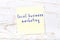 Yellow sticky note with handwritten text local business marketing