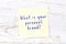 Yellow sticky note with handwritten text what is your personal brand