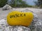 Yellow stone that shows the diivesite Oilslick