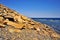 Yellow stones on the beach