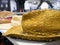 Yellow straw latin american cowboy hat at store shelf