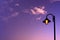 Yellow Street Lamp Silhouette with Dark Purple Sky