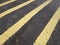 Yellow stripes road markings on the road