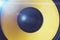 Yellow Subwoofer dynamic or sound speaker with blue light, music and party background