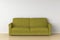 Yellow suede leather sofa in interior.