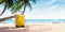Yellow suitcase under palm tree on sunny beach, travel background
