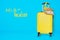 Yellow Suitcases bag with hat on blue background luggage set for copy space. minimal concept. with clipping path on