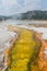 Yellow Sulfur Stream Flows from Steaming Hot Spring